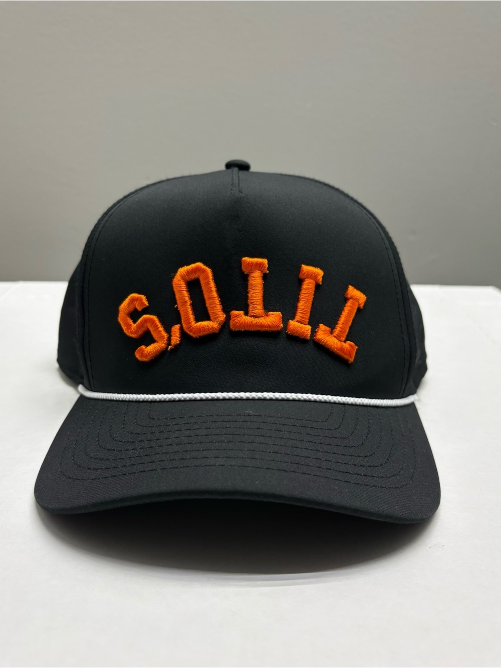 Black Baseball Cap with Orange Embroidered Letters